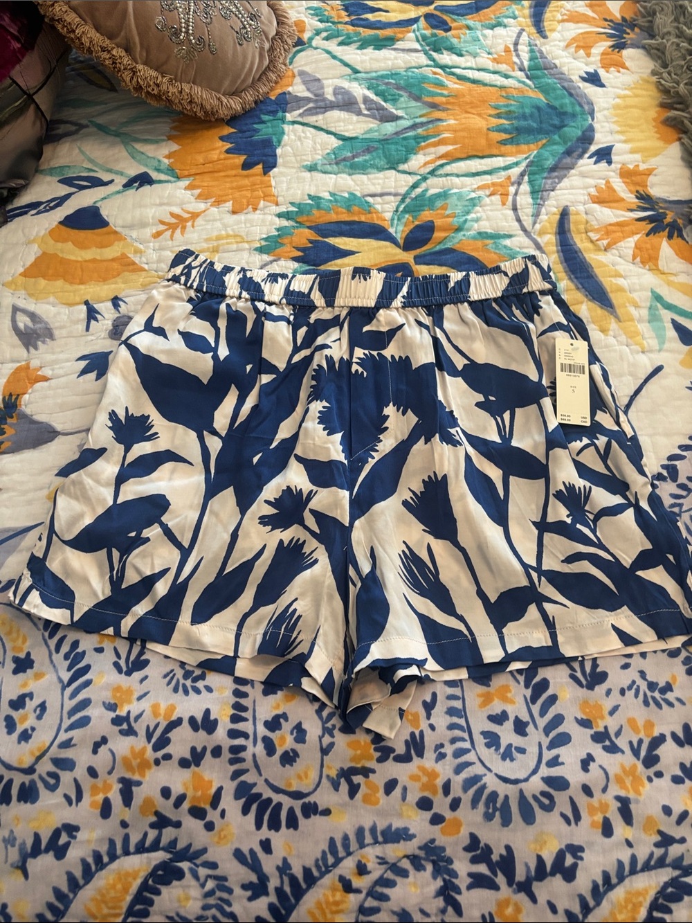 Anthropologie White Shorts with Bold Navy Floral Print
